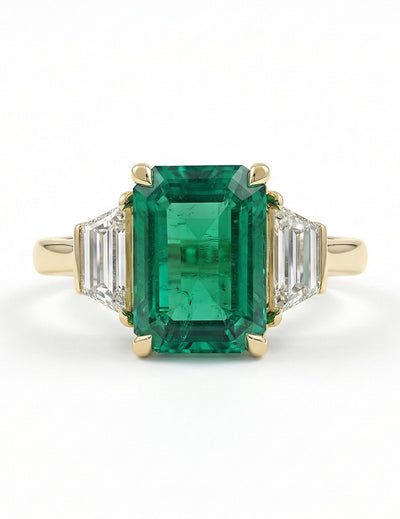 Mid Century Emerald And Trapezoid Diamond Three Stone Ring