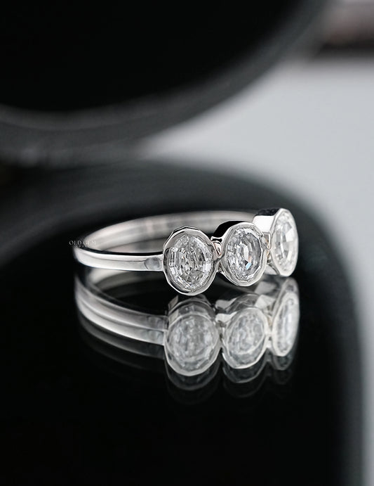 Step Cut Oval Trilogy Ring