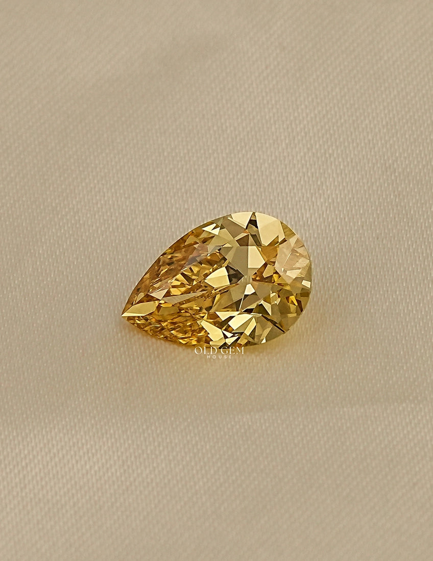 Fancy Vivid Yellow Old Mine Pear Cut Loose Diamond