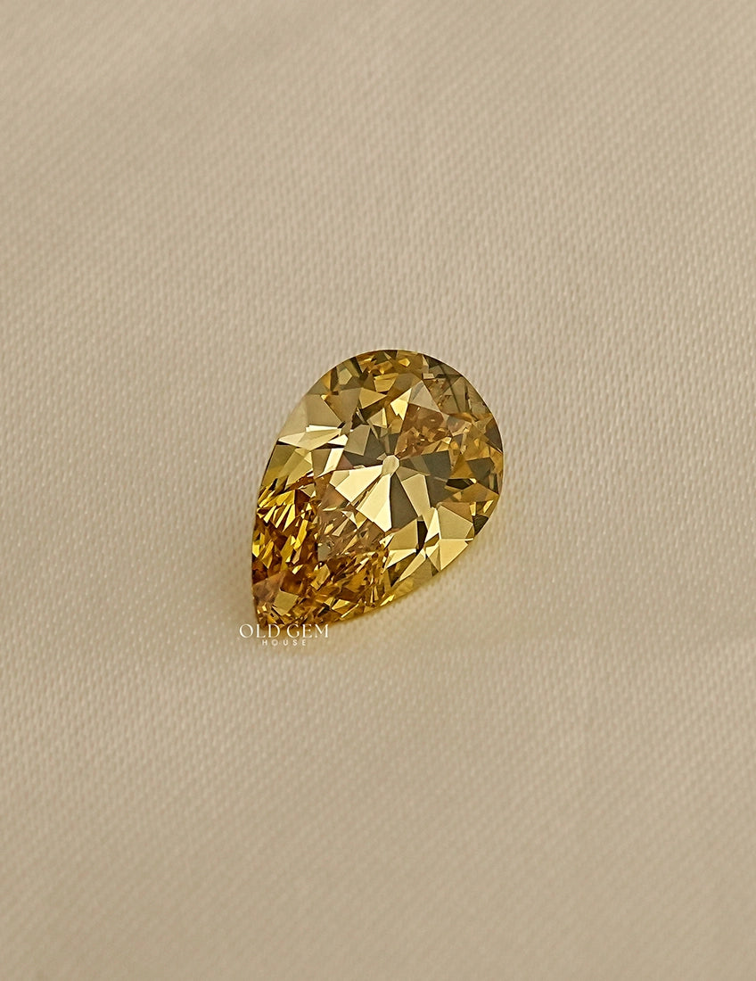 Fancy Vivid Yellow Old Mine Pear Cut Loose Diamond