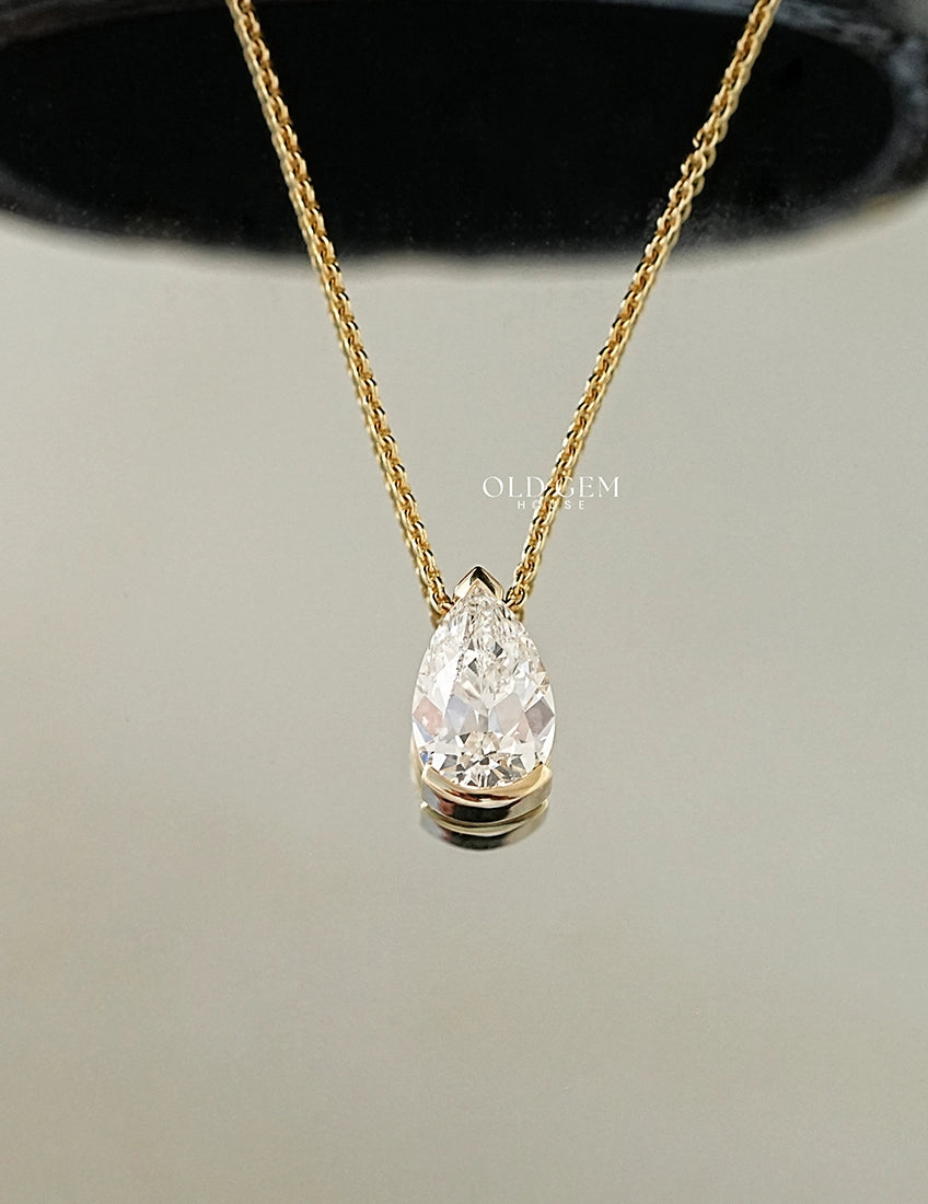 Old Mine Pear Diamond Half Bezel Set Pendant Necklaces
