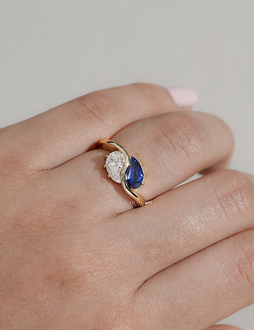 Two Stone Sapphire Modified Pear Gemstone Curved Ring