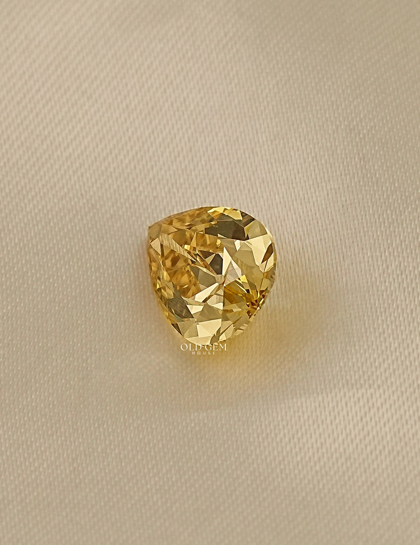 Fancy Vivid Yellow Old Mine Pear Cut Loose Diamond